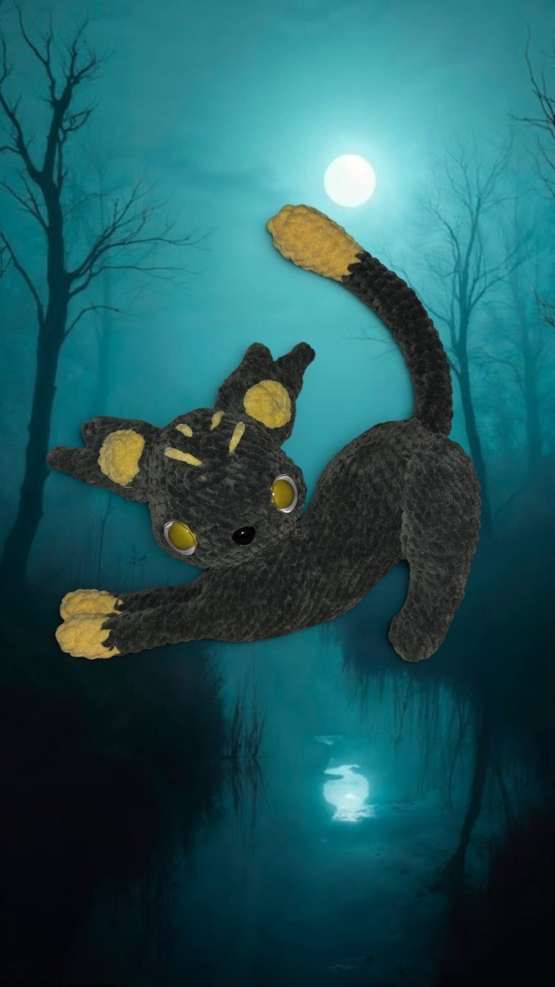 BrainRotPop handcrafted plush creature in charcoal black and golden-yellow chenille yarn with large luminous eyes.