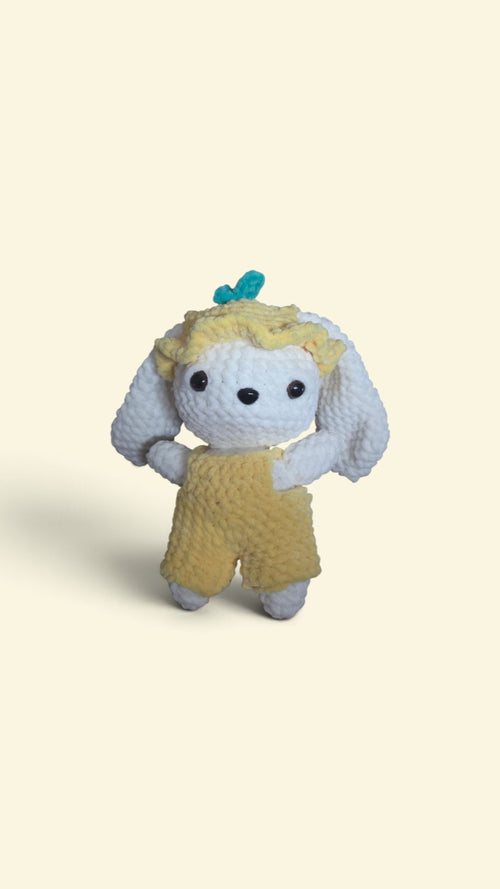 BrainRotPop handmade crochet bunny plushie in white yarn wearing yellow dungarees and a matching sun hat