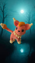 BrainRotPop handmade orange and cream crochet Fire Magicat plushie with soft yarn, fluffy tail, and expressive eyes.