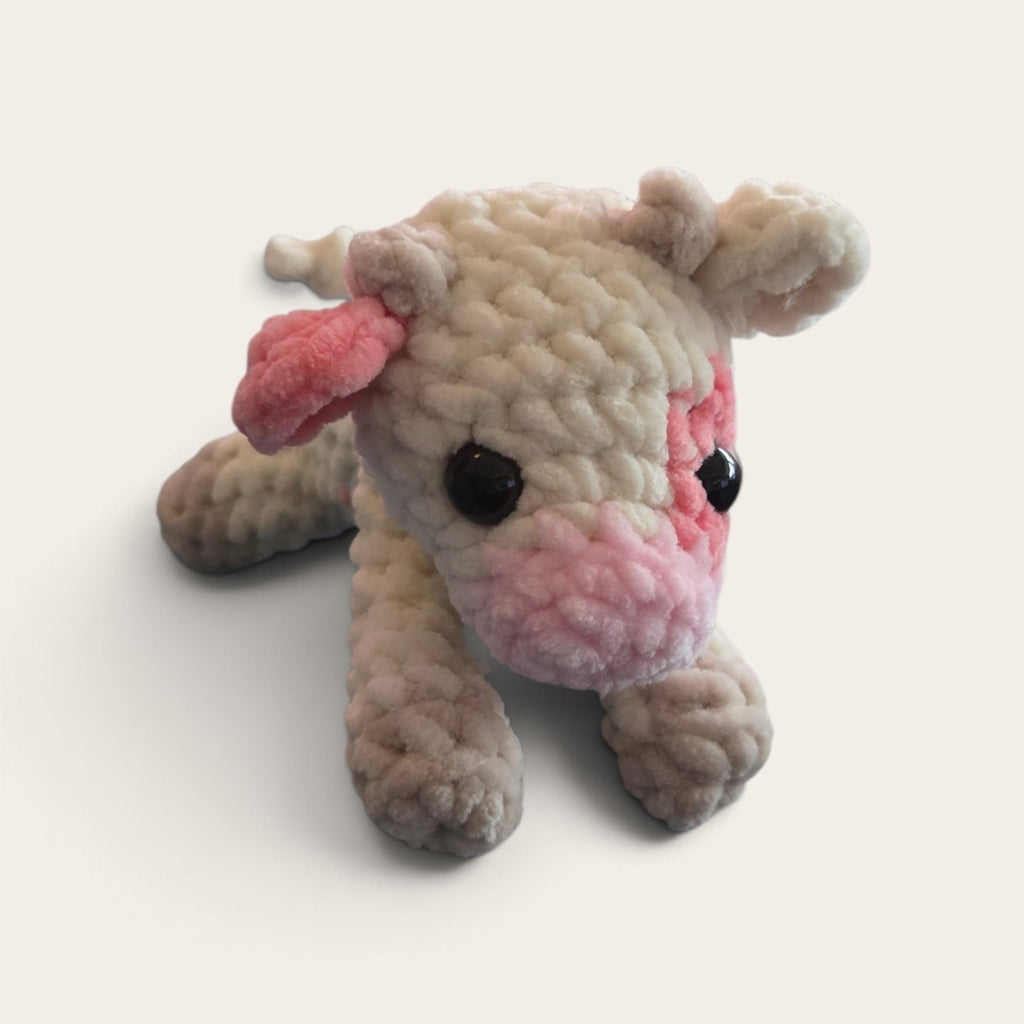 BrainRotPop handmade cream and pink crochet cow plushie made from soft chenille yarn with secure safety eyes.
