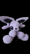 BrainRotPop handmade lavender crochet plushie creature with large sparkling eyes and soft velvety yarn texture